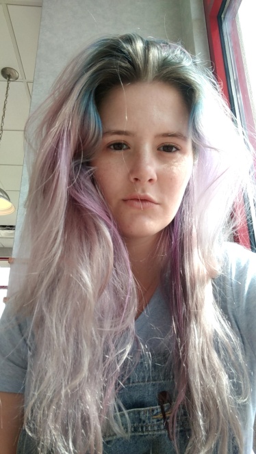 barely blue roots, mostly purple with some pink/silver ends
